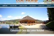 Case din lemn rotund